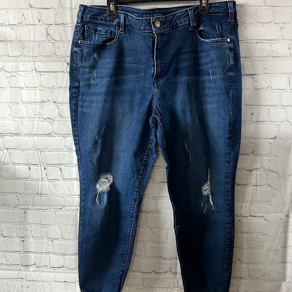 22 Lane Bryant distressed skinny blue jeans. Raw hem edge Very good cond…